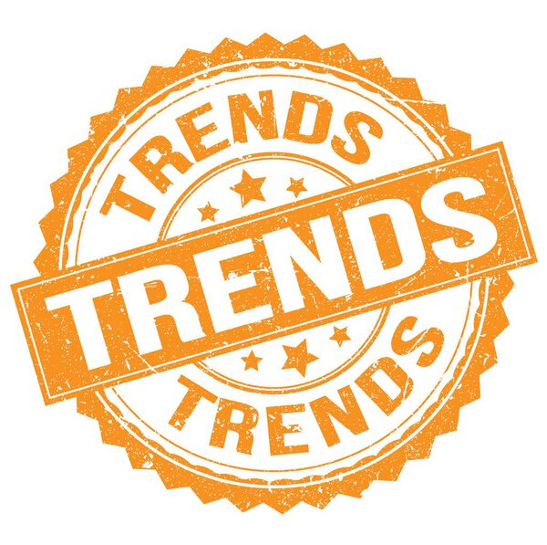 TRENDS text written on orange round stamp sign