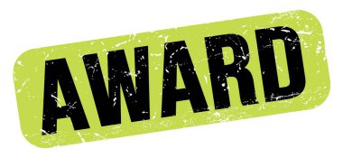 AWARD metni yeşil-siyah grungy işareti üzerine yazılmış.