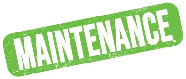 Yeşil grungy işareti üzerine yazılmış MATENANCE metni.