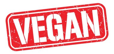 VEGAN text written on red grungy stamp sign.