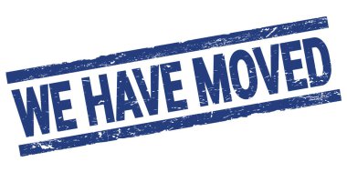 WE HAVE MOVED text written on blue rectangle stamp sign.