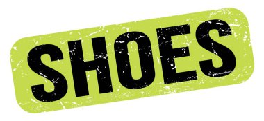SHOES text written on green-black grungy stamp sign.