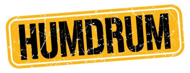 Turuncu-siyah grungy işareti üzerine yazılmış HUMDRUM metni.