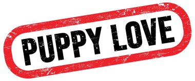 PUPPY Love, kırmızı-siyah dikdörtgen işareti üzerinde metin.