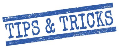 TIPS & TRICKS metni mavi grungy satır işareti üzerine yazıldı.
