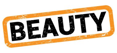 BEAUTY text written on orange-black rectangle stamp sign.