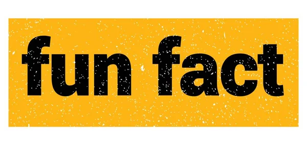 fun fact text written on yellow-black grungy stamp sign.