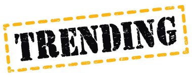 Sarı-siyah pano işareti üzerine yazılmış TRENDING metni.