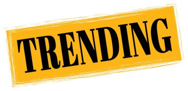 Turuncu-siyah dikdörtgen işareti üzerine yazılmış TRENDING metni.