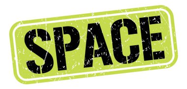 SPACE text written on green-black grungy stamp sign.