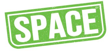 SPACE text written on green grungy stamp sign.