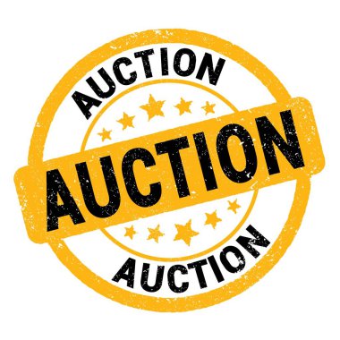 AUCTION text written on yellow-black grungy stamp sign.