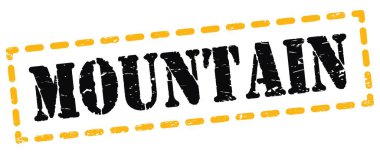 MOUNTAIN text written on yellow-black dash stamp sign.