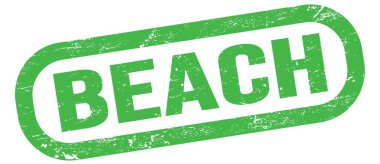 BEACH, text written on green rectangle stamp sign.