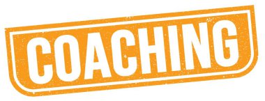 Koçluk metni turuncu grungy işareti üzerine yazılmış..