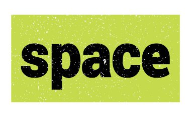 space text written on green-black grungy stamp sign.