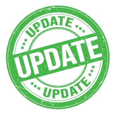 UPDATE text written on green round grungy stamp sign