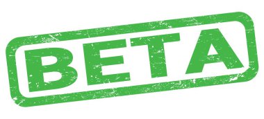 BETA text written on green rectangle stamp sign.