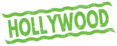 HOLLYWOOD text written on green lines stamp sign.