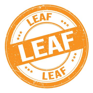 LEAF text written on orange round grungy stamp sign