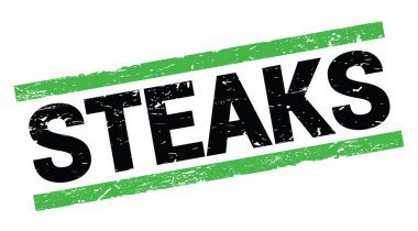 STEAKS text written on green rectangle stamp sign.