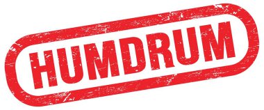 HUMDRUM, text on red rectangle stamp sign.