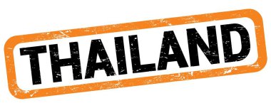 THAILAND text written on orange-black rectangle stamp sign.