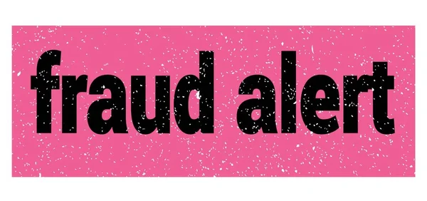 fraud alert text written on pink-black grungy stamp sign.