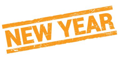 NEW YEAR text written on orange rectangle stamp sign.