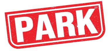 PARK text written on red grungy stamp sign.