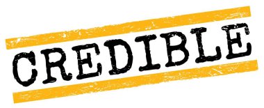 CREDIBLE metni sarı-siyah grungy satır işareti üzerine yazılmış.