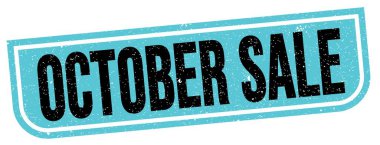 OKTOBER Satış metni mavi-siyah grungy işareti üzerine yazılmış.