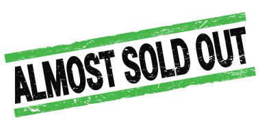 Siyah-yeşil dikdörtgen mühür işareti üzerine neredeyse satılmış metin.