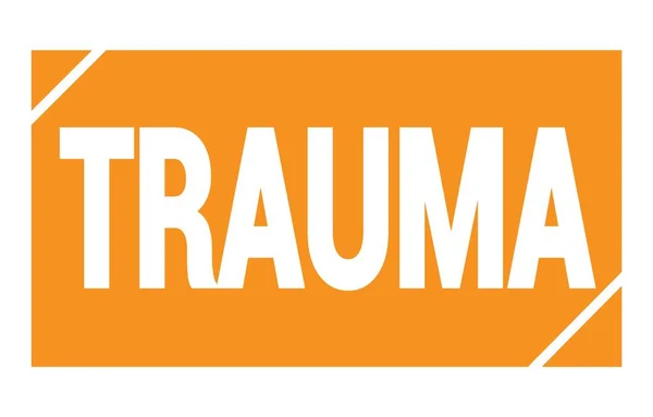Trauma文字写在橙色矩形邮票上 — 图库照片