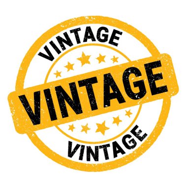 VINTAGE text written on yellow-black grungy stamp sign.