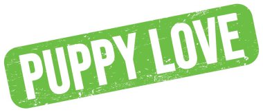 Yeşil grungy işareti üzerine yazılmış PUPPY Love metni.