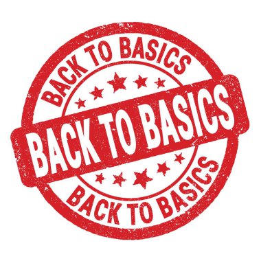 BACK TO BASICS text written on red grungy stamp sign.