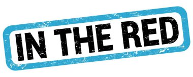 Mavi-siyah dikdörtgen işareti üzerine yazılmış kırmızı metinde.