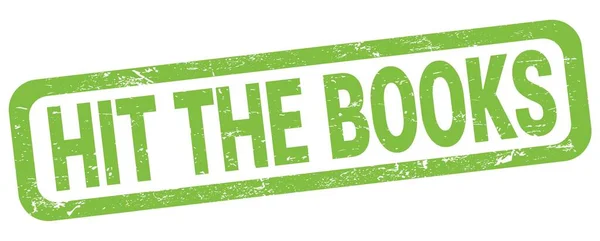 HIT THE BOOKS text written on green rectangle stamp sign.