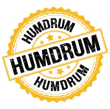 Sarı-siyah yuvarlak mühür işareti üzerine yazılmış HUMDRUM metni