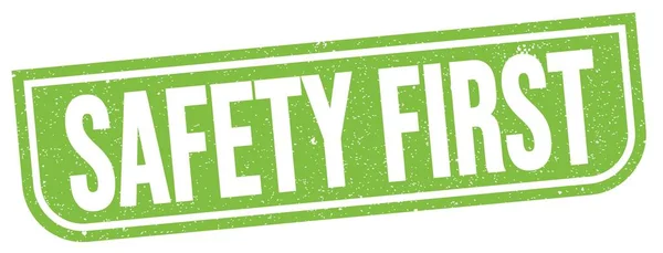 Safety First Text Written Green Grungy Stamp Sign — ストック写真