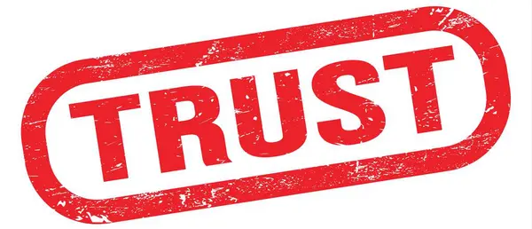 Trust 赤い四角形の切手記号で書かれたテキスト — ストック写真