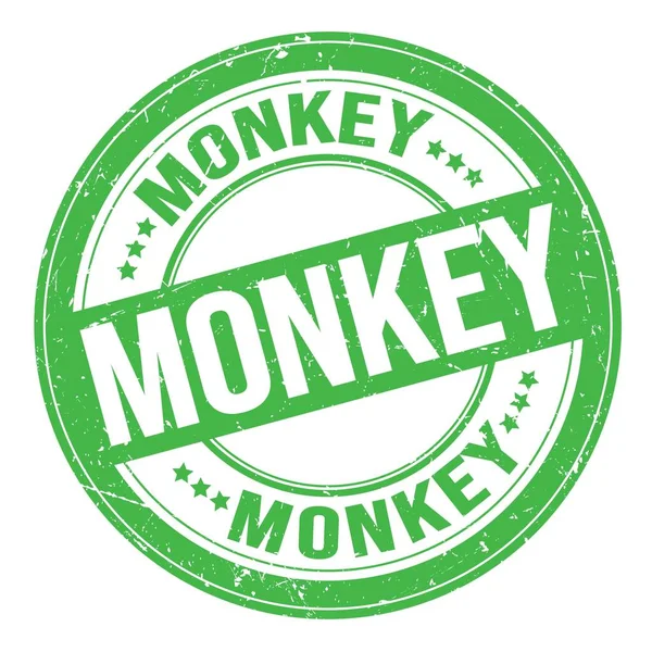 Monkey文字写在绿色圆圆的黑色邮票上 — 图库照片