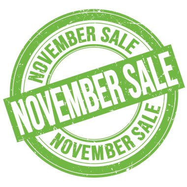 Yeşil yuvarlak pul işareti üzerine yazılmış Kasım Satışı metni