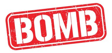 BOMB text written on red grungy stamp sign.