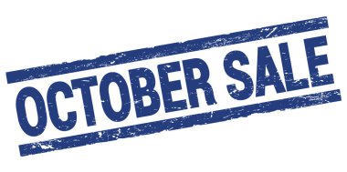 Mavi dikdörtgen damga işareti üzerine yazılmış OKTOBER Satışı metni.