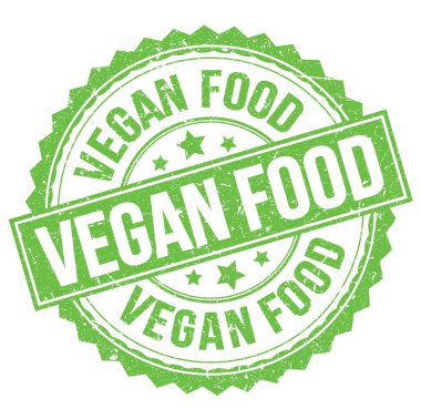 Yeşil yuvarlak mühür işareti üzerine yazılmış VEGAN FOOD metni