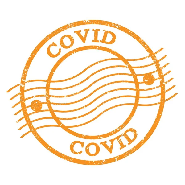 Covid Text Skriven Orange Grungy Poststämpel — Stockfoto