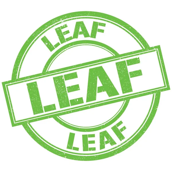 Yeşil yuvarlak pul işareti üzerine yazılmış LeAF metni