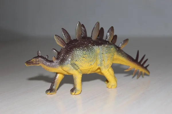 Stegosaurus toy dinosaur on white background